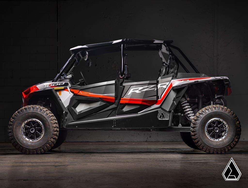 Picture from the side of the Assault Industries Polaris RZR XP 4 1000 Rock Sliders