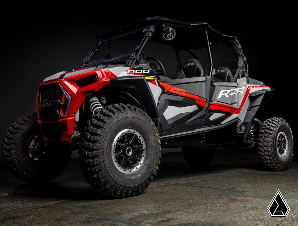 Picture from the front angle of the Assault Industries Polaris RZR XP 4 1000 Rock Sliders