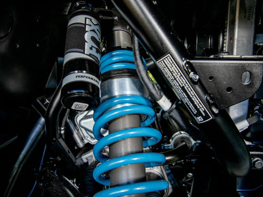 Picture of the front suspension with the Polaris XPEDITION 3" Lift Kit installed