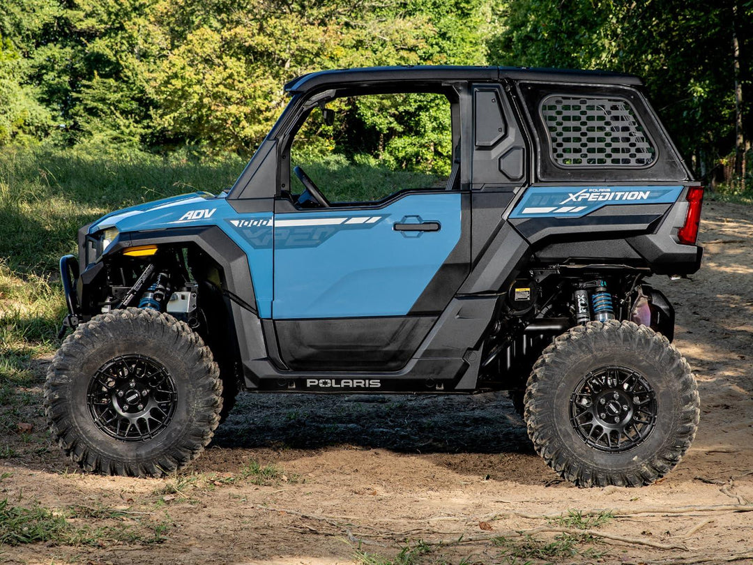 Picture from the side of the Polaris XPEDITION 3" Lift Kit installed
